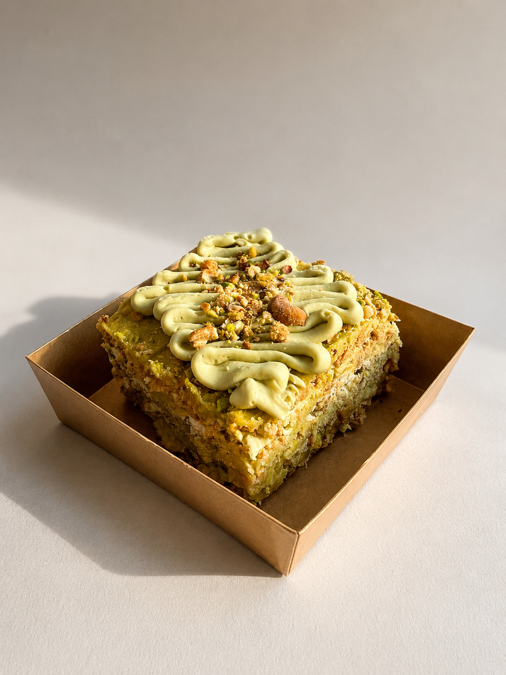Pistachio Sans Rival Cake Slice